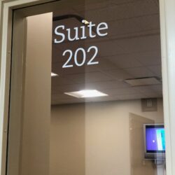 Window with the words Suite 202